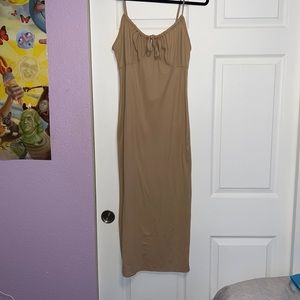 Long slim fitting tan dress